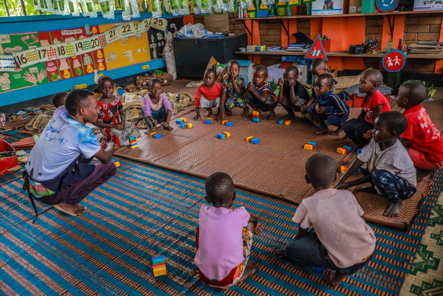 Lucky ECD in Kyaka continues to offer early learning opportunities to learners in both the refugee and host communities. Caregivers like Benon have been central to this service.
